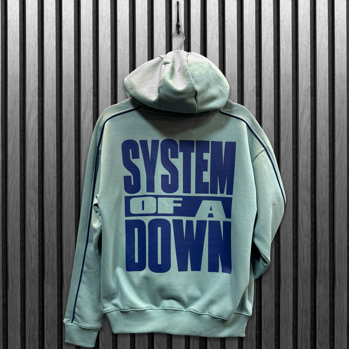 System Of A Down Unisex Pullover Hoodie: Stockholm Event Tour '26 (Light Blue) (Back Print & Ex-Tour)
